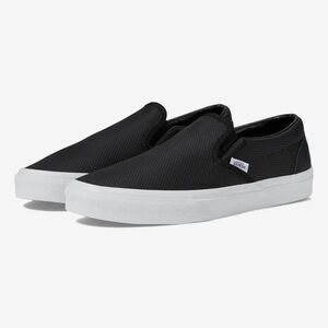Vans Perforated Leather Black and White Slip-On Sneakers